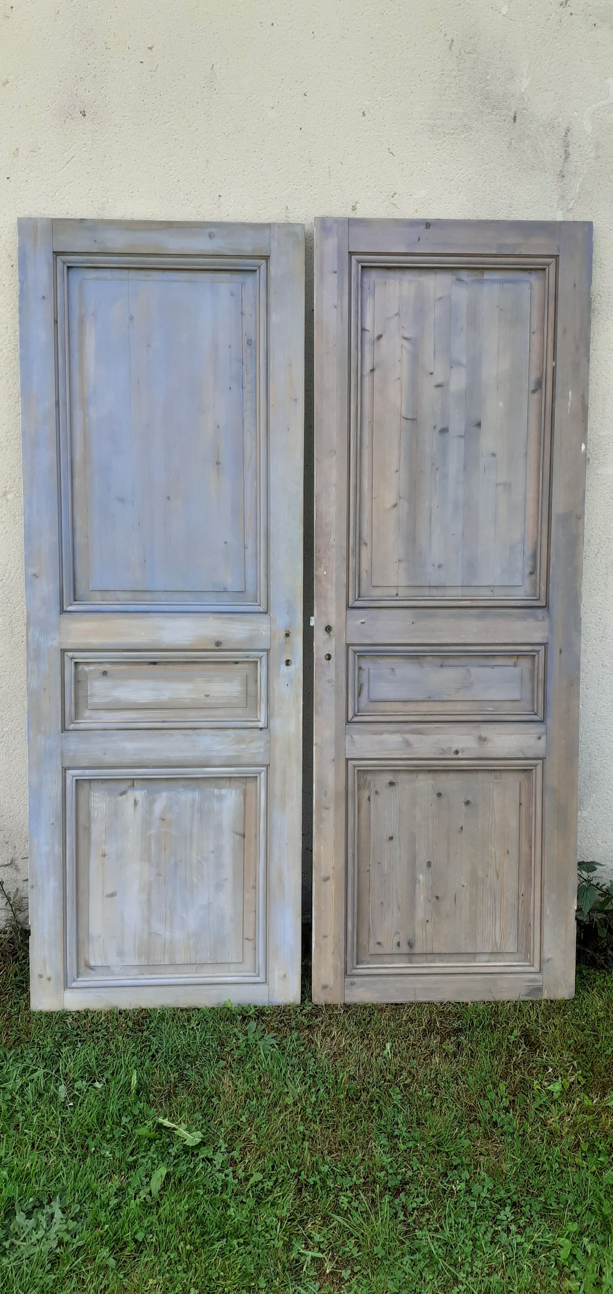Pairs of Haussmannian doors in patinated aged wood