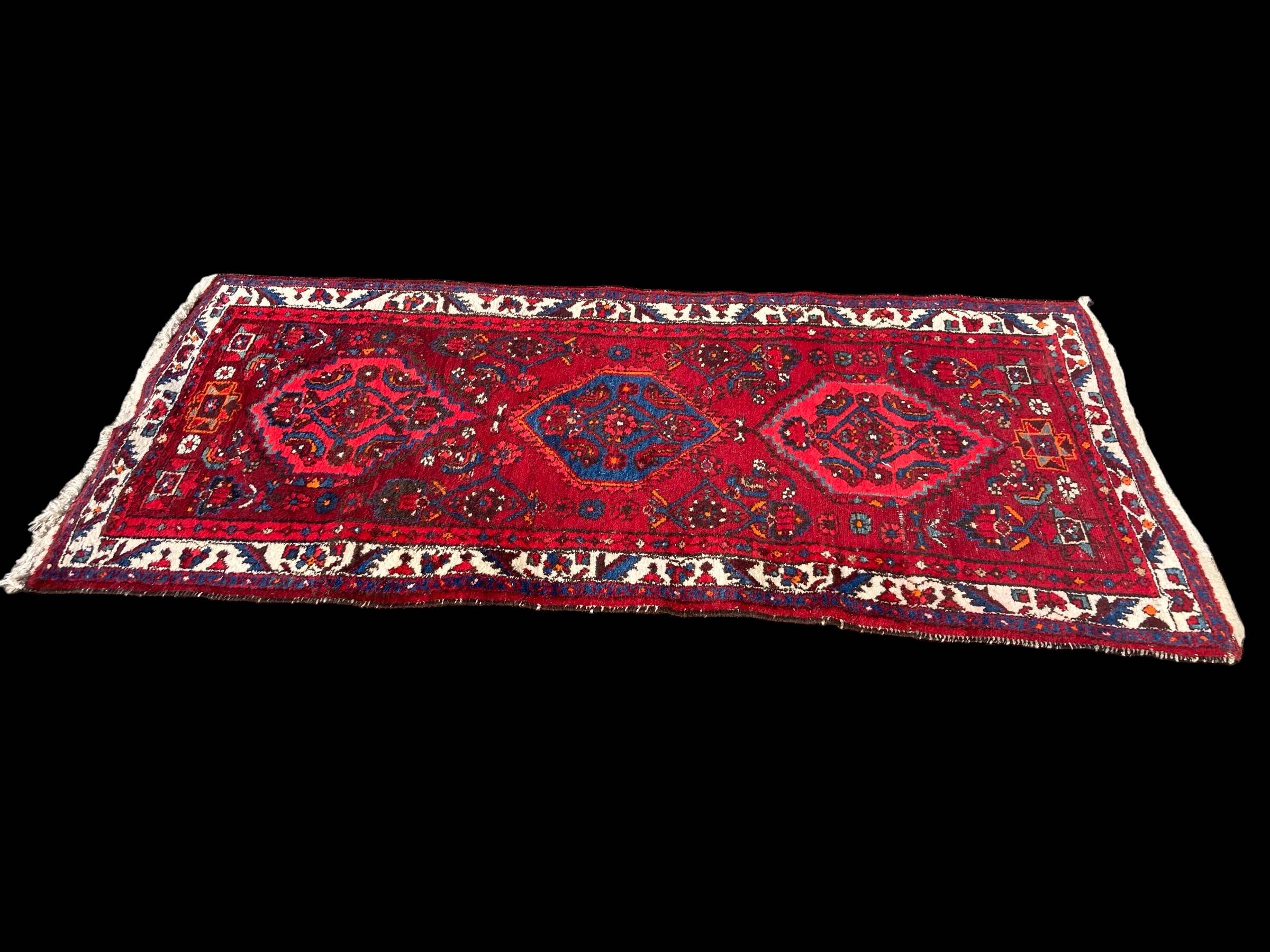 Hand-woven Iranian rug