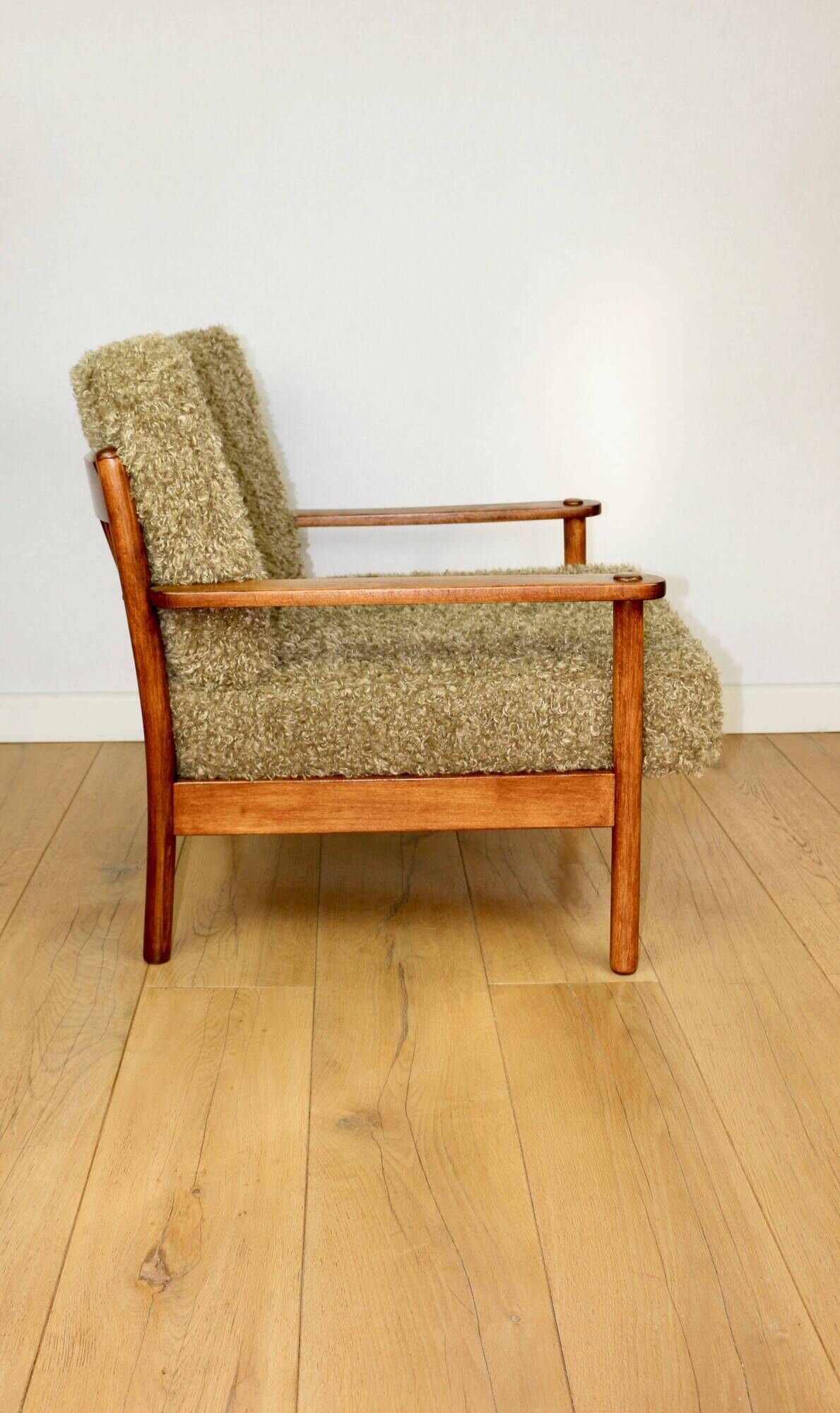 Wooden vintage brown armchair, olive green, long pile on removable cushions