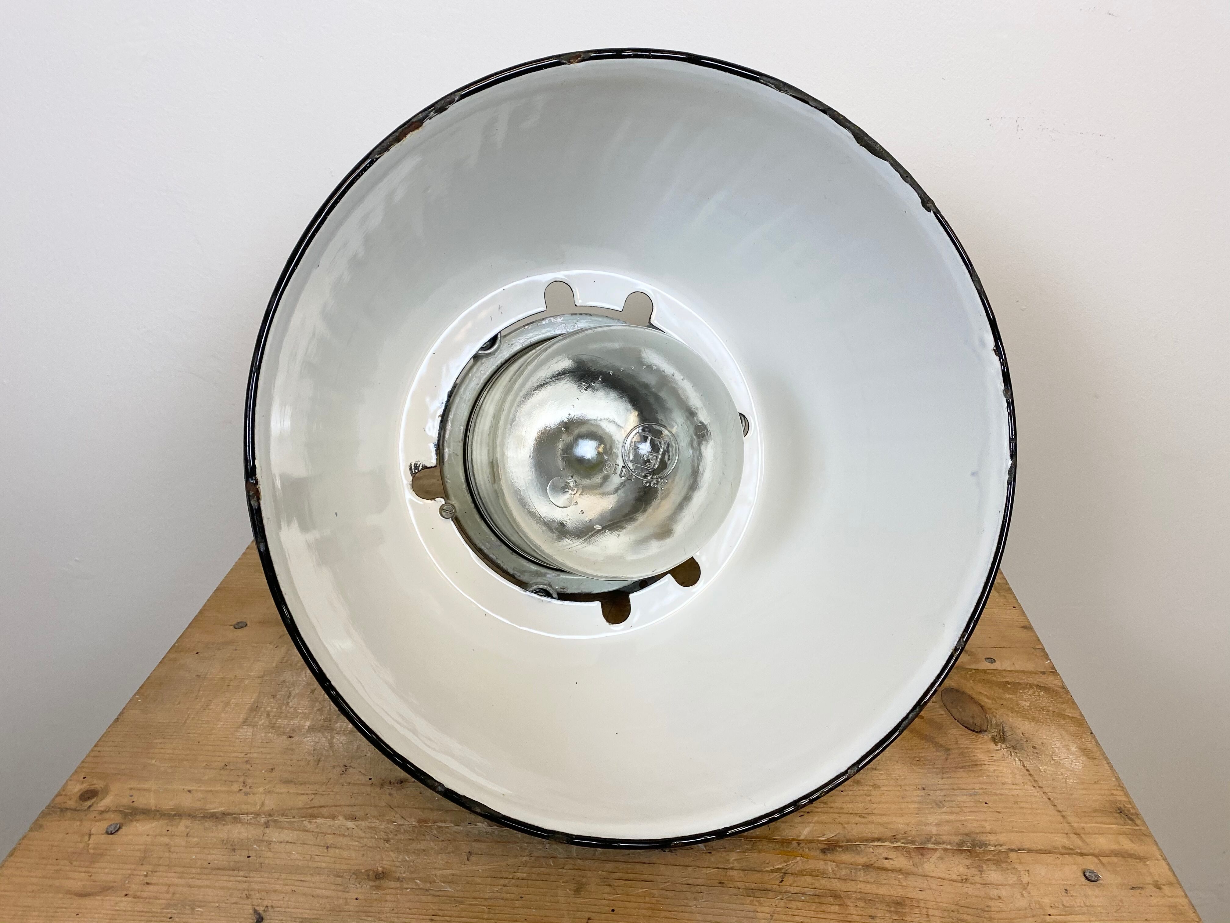 Grey cast aluminium explosion proof lamp with black enameled shade