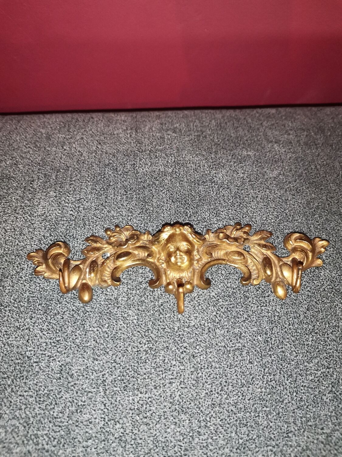 Porte clé patère doré