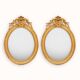 Pair of 19th century French oval gold leaf mirrors