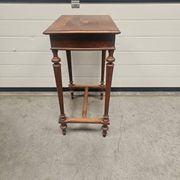 Antique dressing table with floral marquetry and integrated mirror.