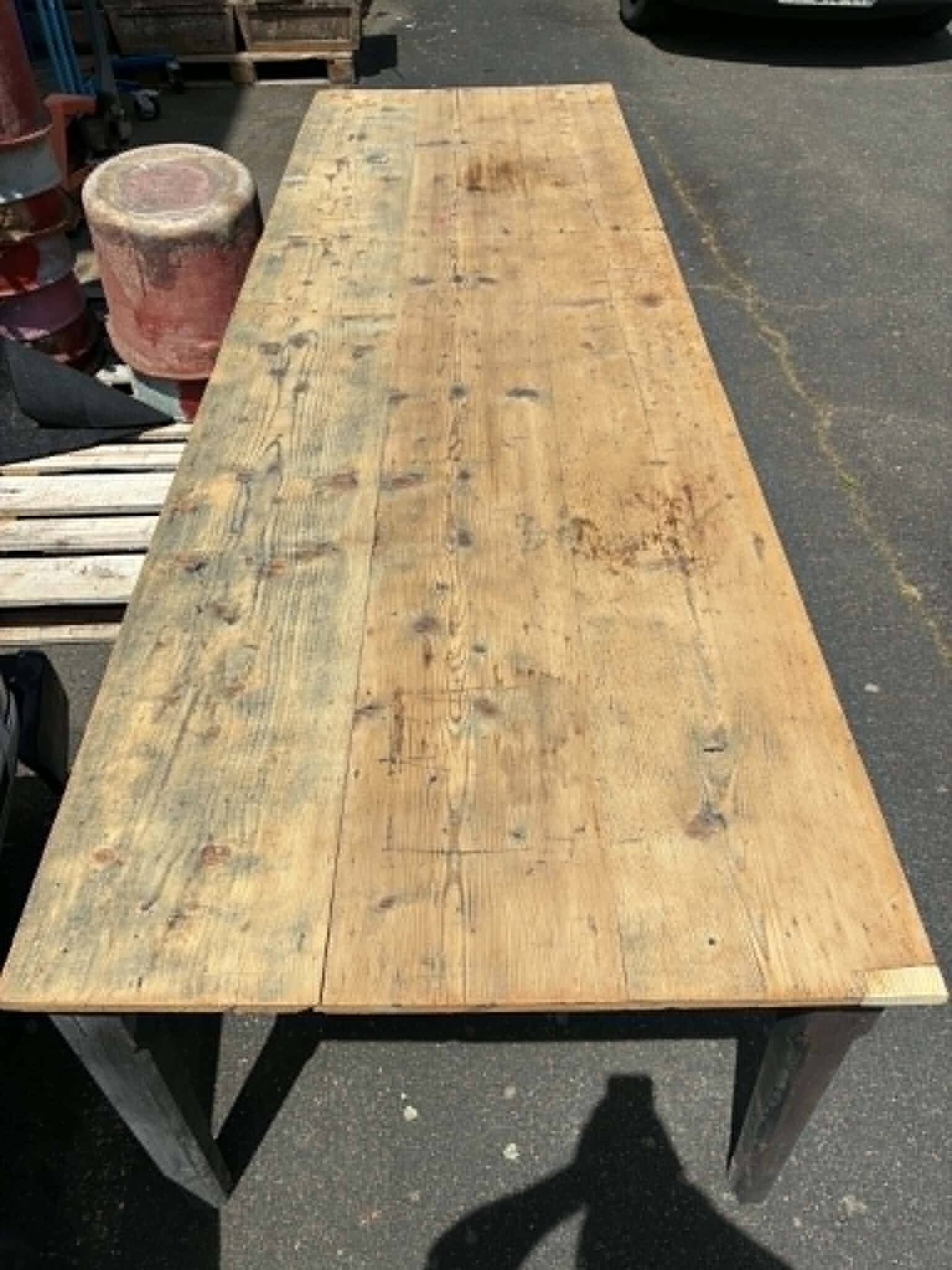 Black dining table in fir.