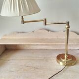 Large golden brass lamp with a movable arm - adjustable desk lamp