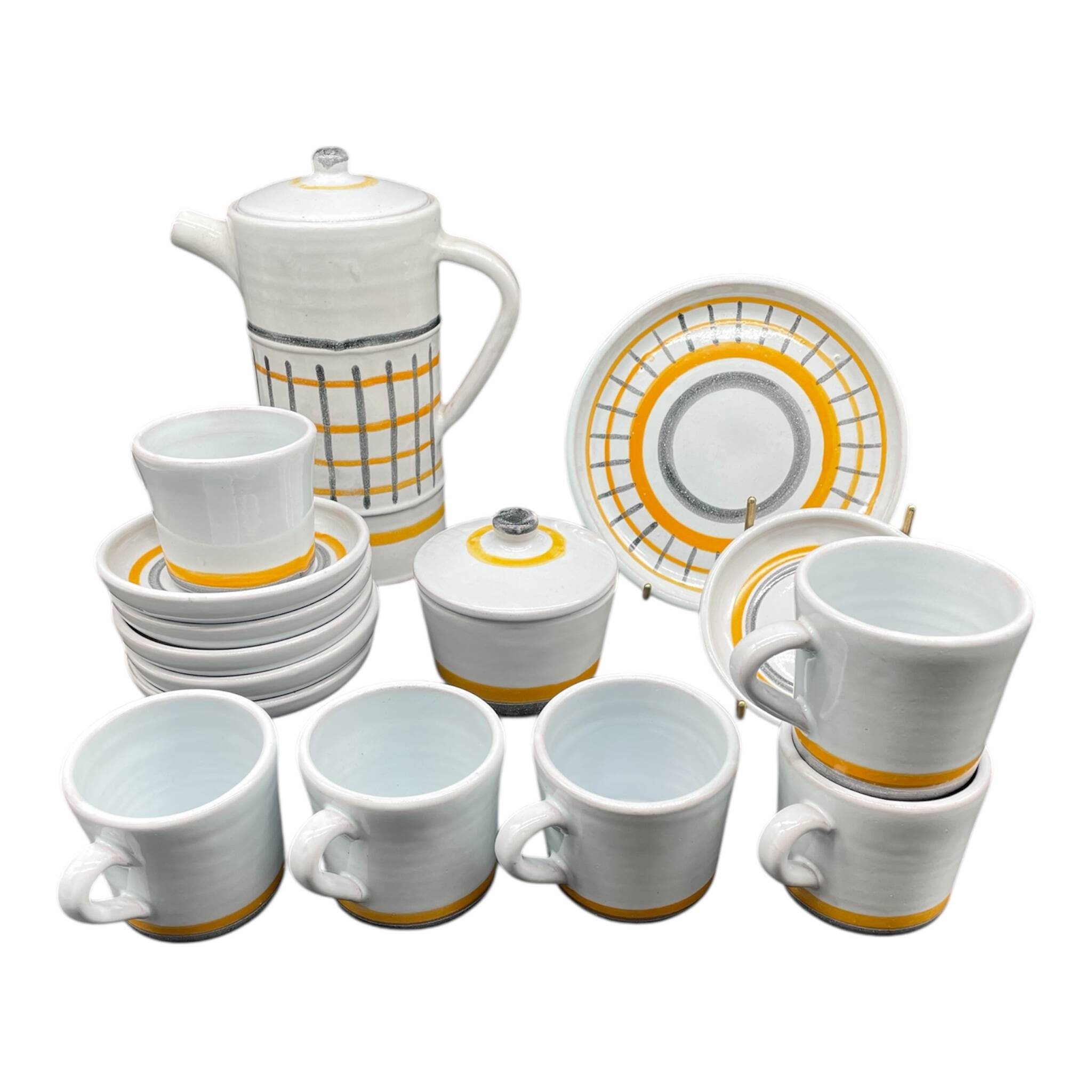Vintage 1960s coffee service in ceramic, modernist design.