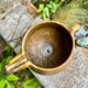 Antique terracotta milk jug