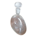 Clear bubble glass bottle molded for easy manual gripping