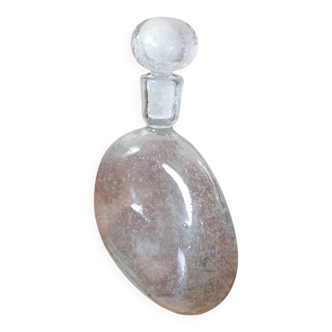 Clear bubble glass bottle molded for easy manual gripping