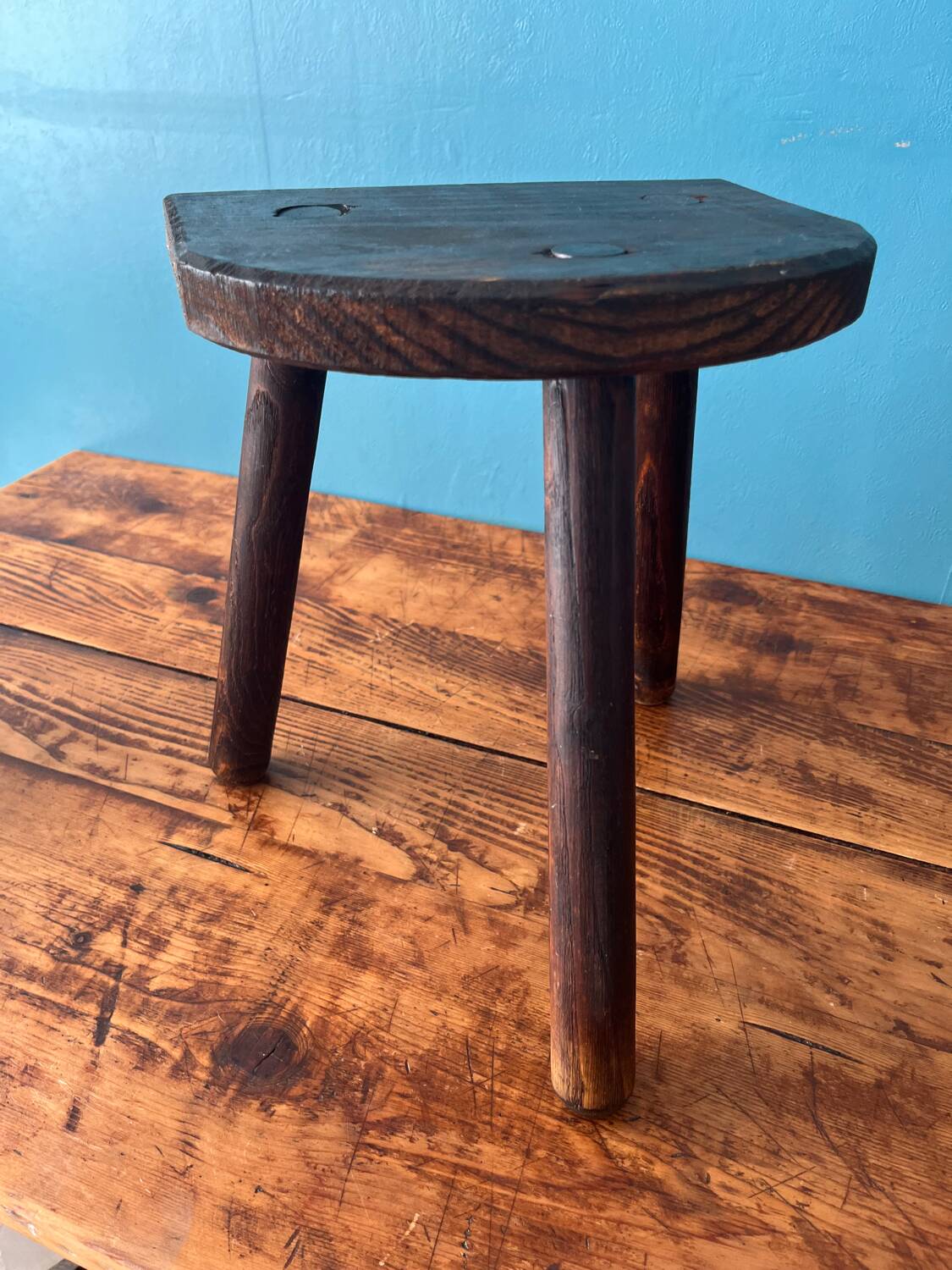 Wooden milking tripod stool