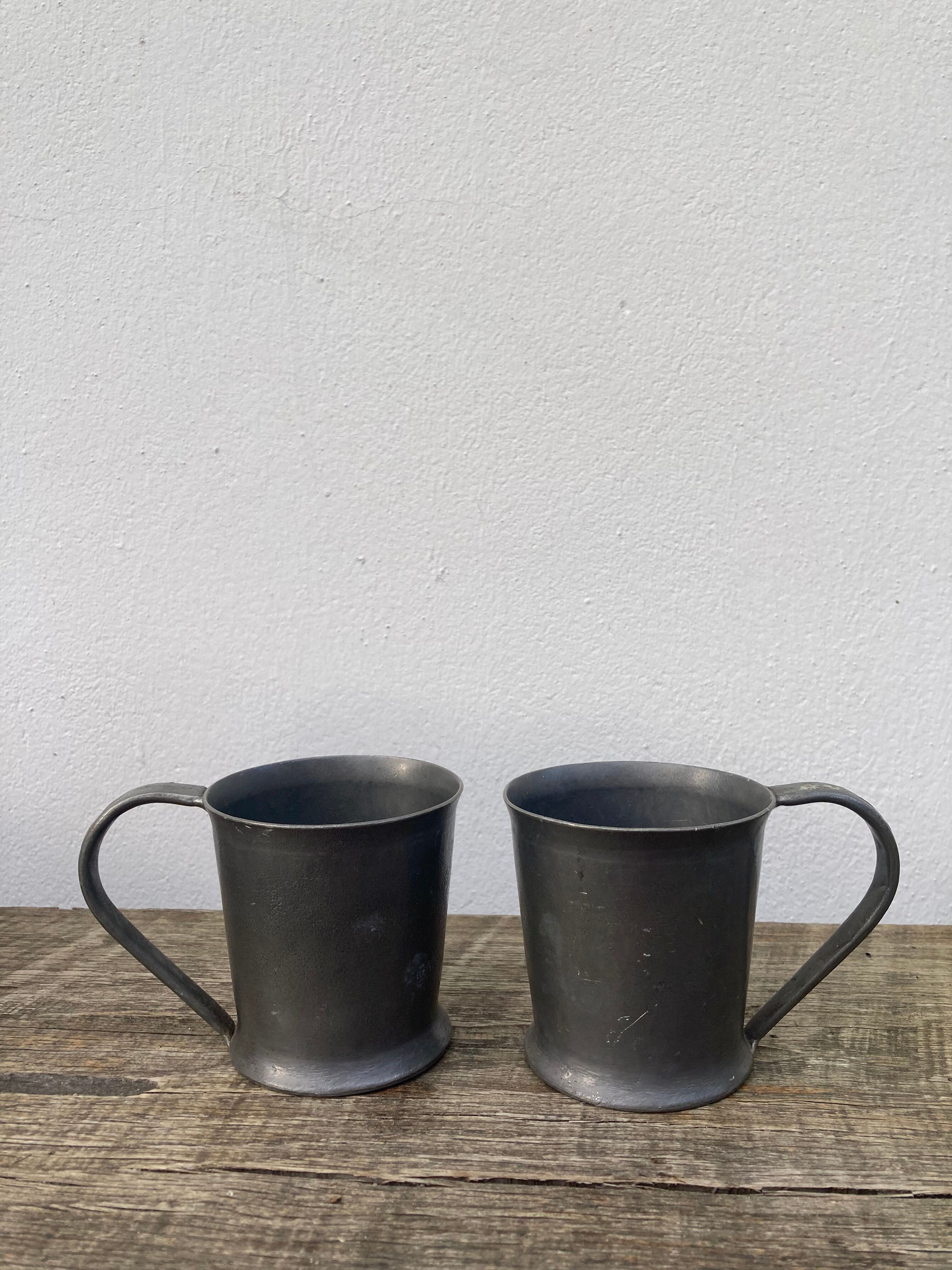 Pair of brutalist pewter cups signed