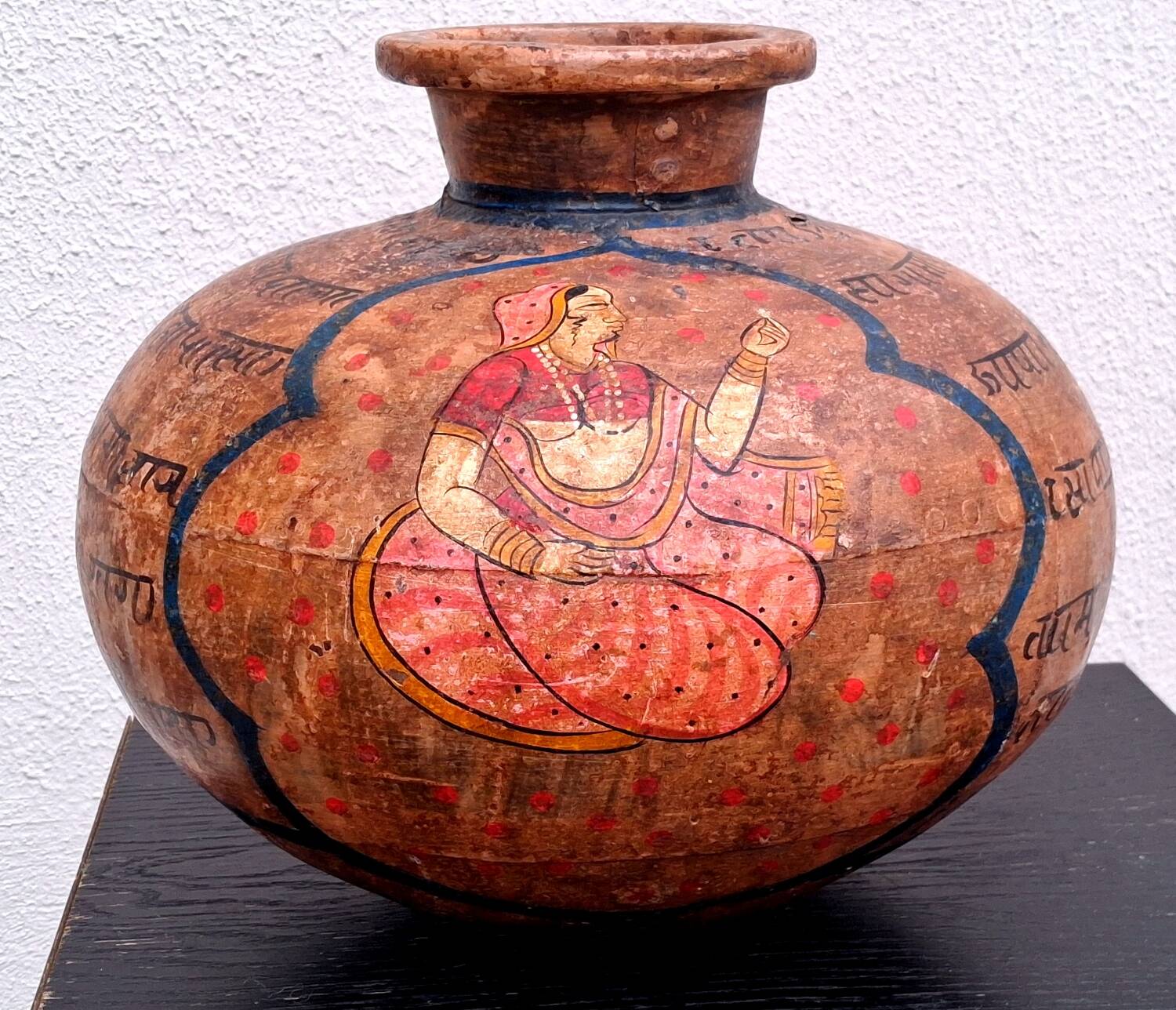 Terracotta vase, decoration of Persian figures.