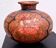 Terracotta vase, decoration of Persian figures.