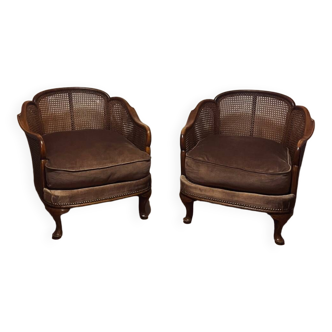 Paire de fauteuils canés en bois et velours