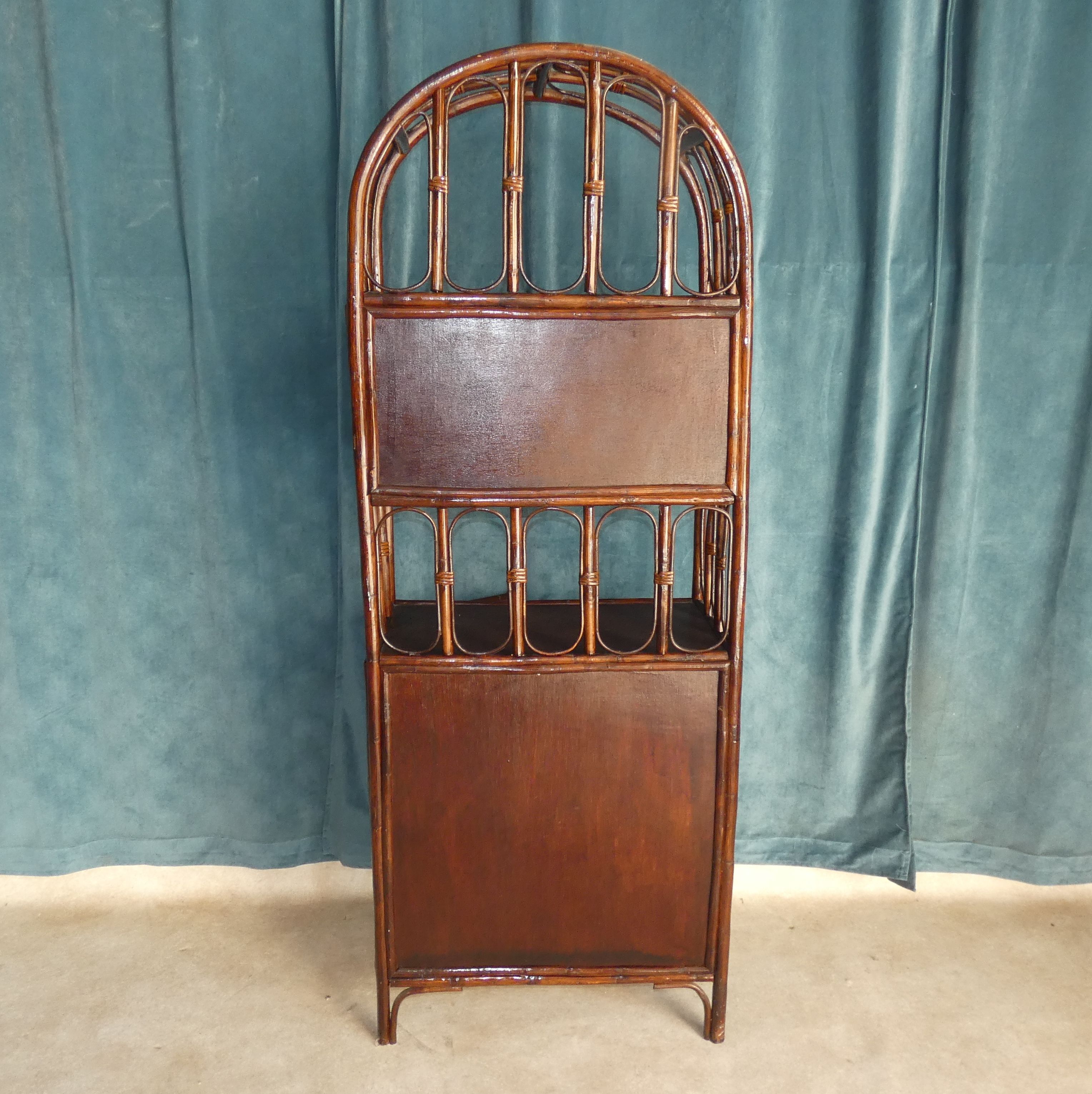 Library in Bamboo and Cane of Rattan Varnish Brown circa 1970 H 175 cm