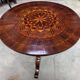 Round "Sorrentino" gueridon inlaid with a rosette design.