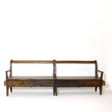 Handcrafted wooden bench with armrest and left drawer.