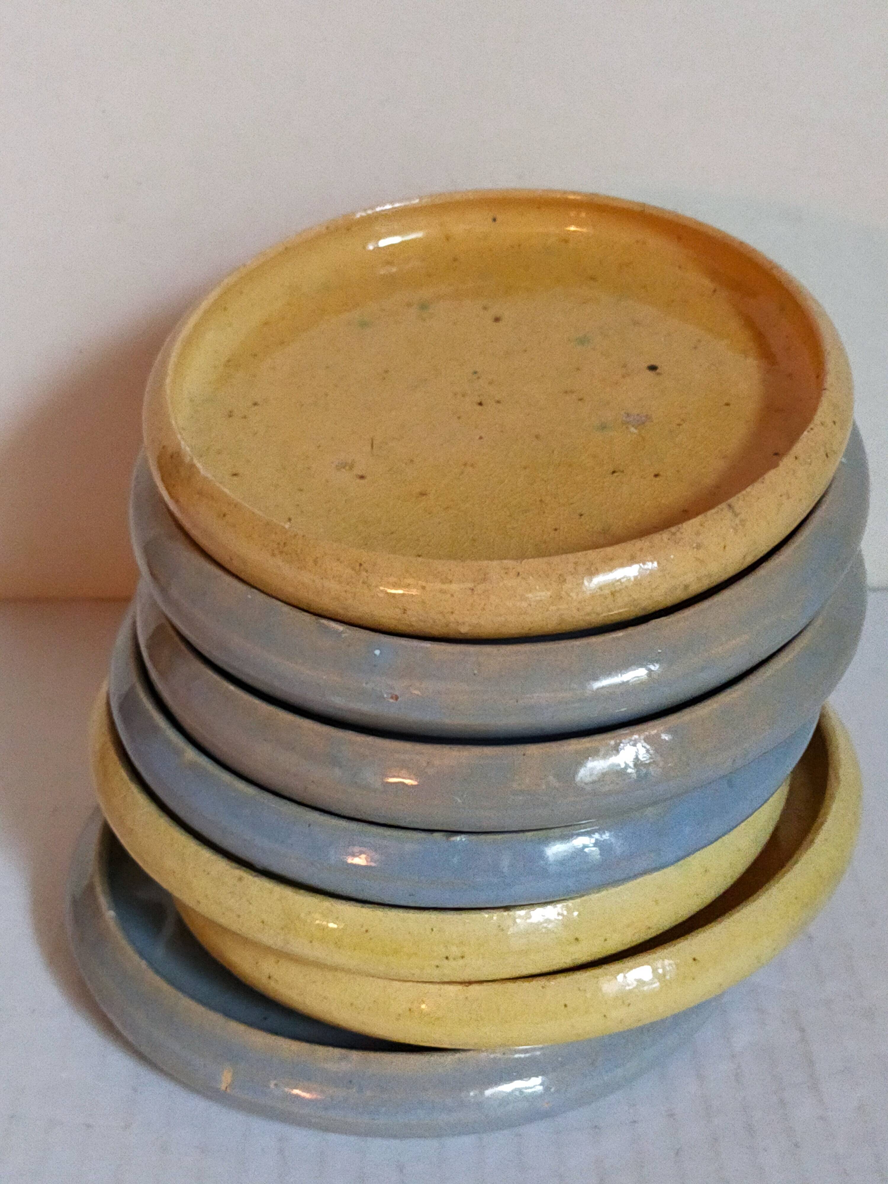 Seven vintage potter's sweet treat plates