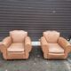 Pair of club chairs in skai