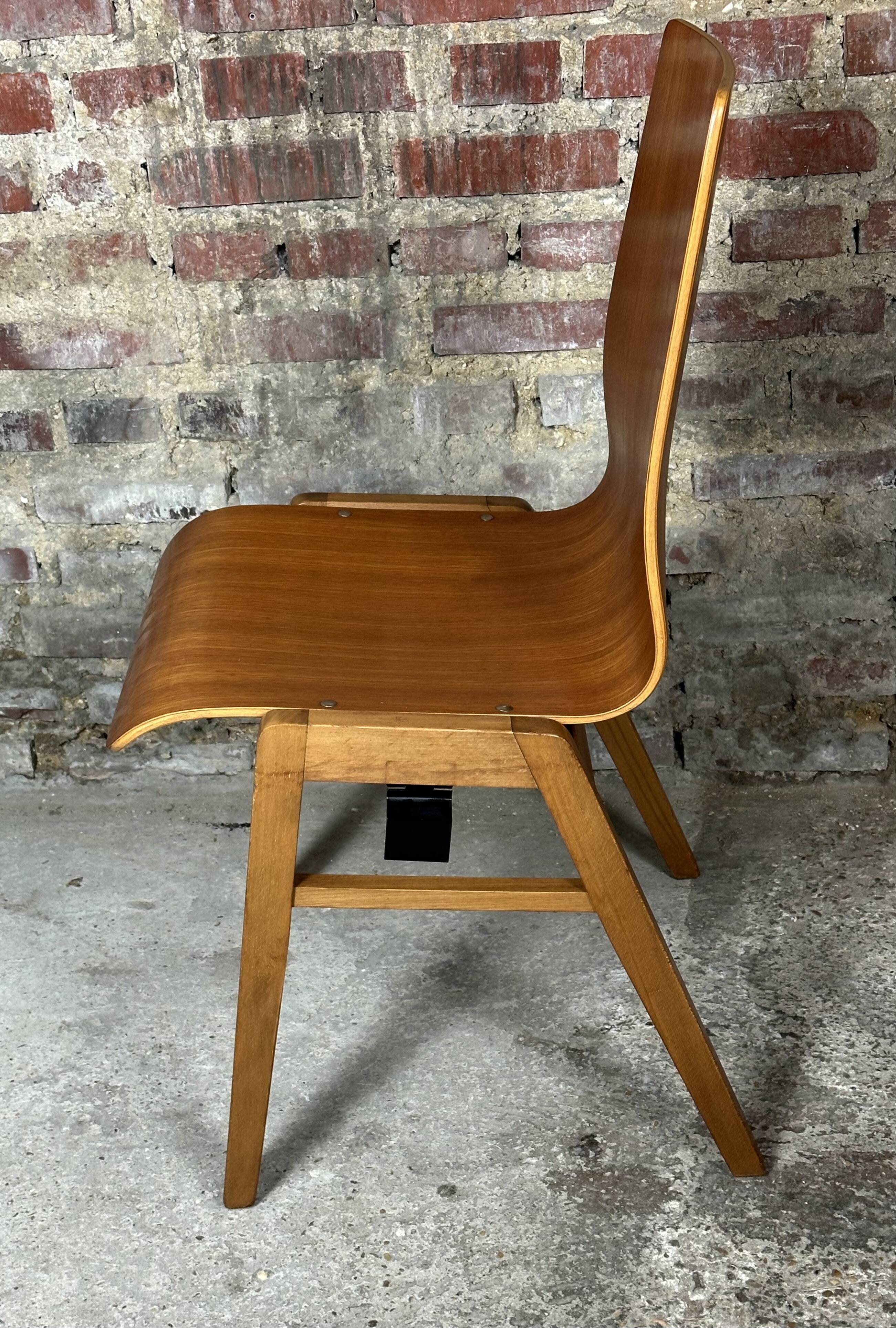 Scandinavian chairs (set of 8) in thermoformed beech from the 1960s.