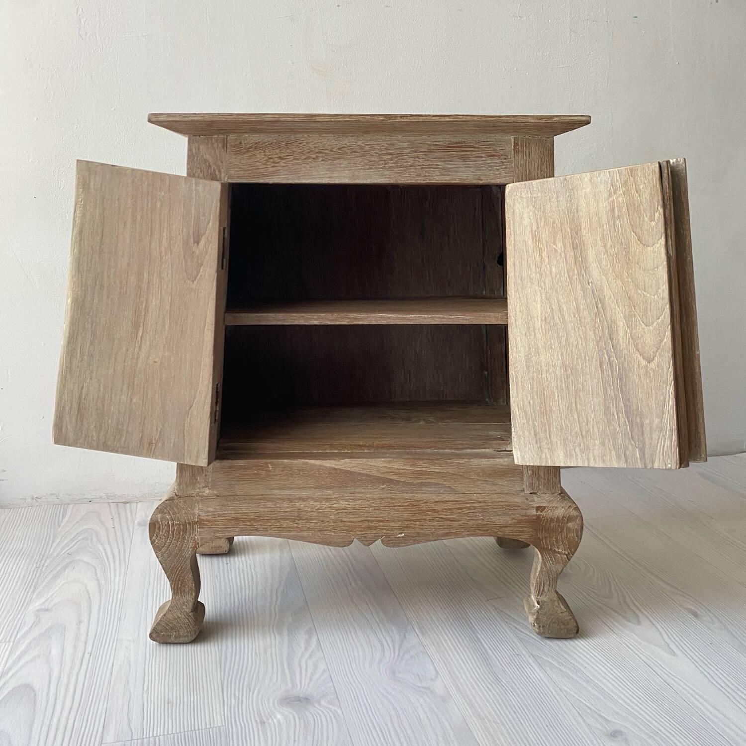 Balinese bedside table in solid carved and limed wood