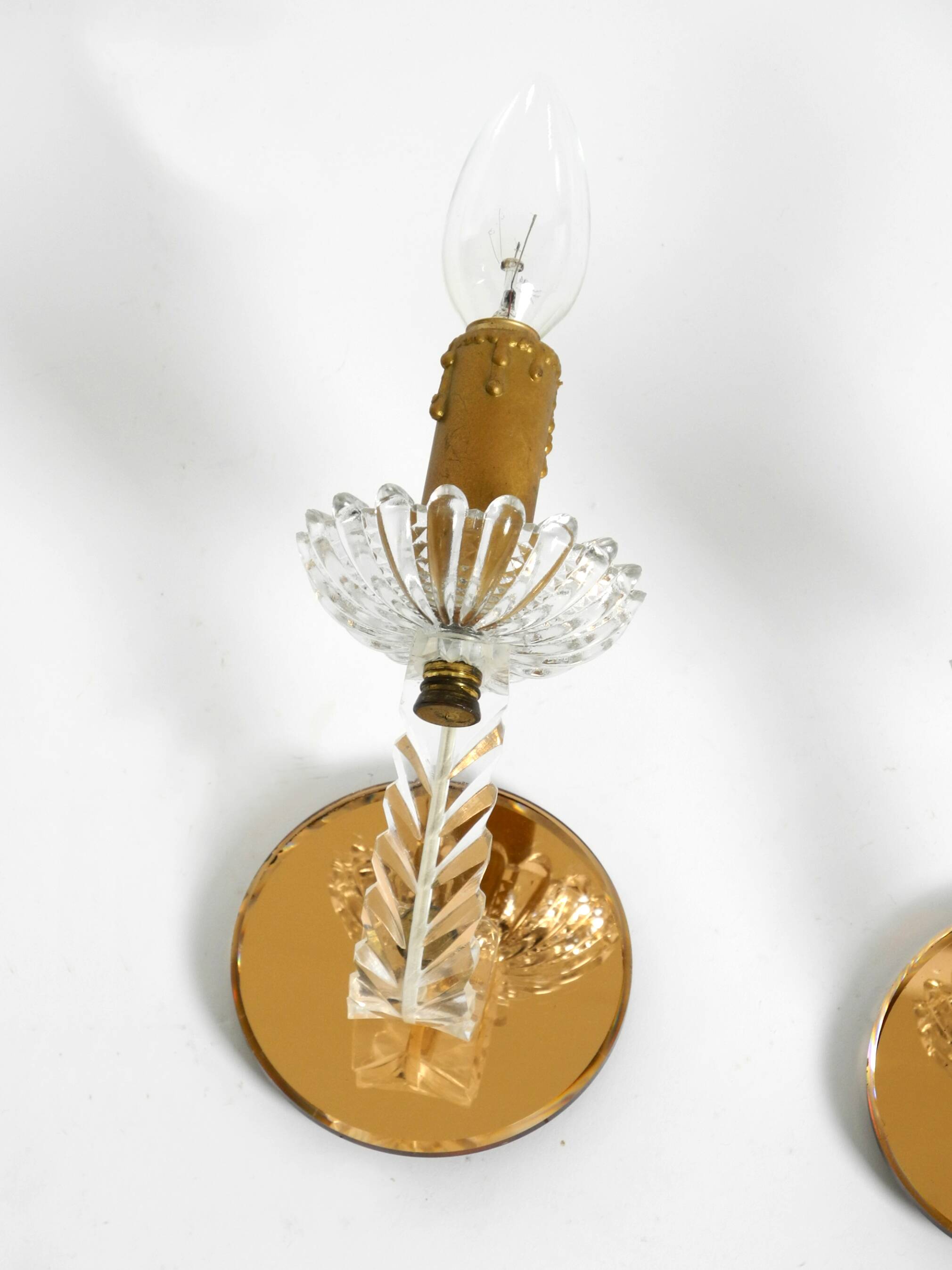 Two original Italian 1960s wall lamps with glass and mirror components