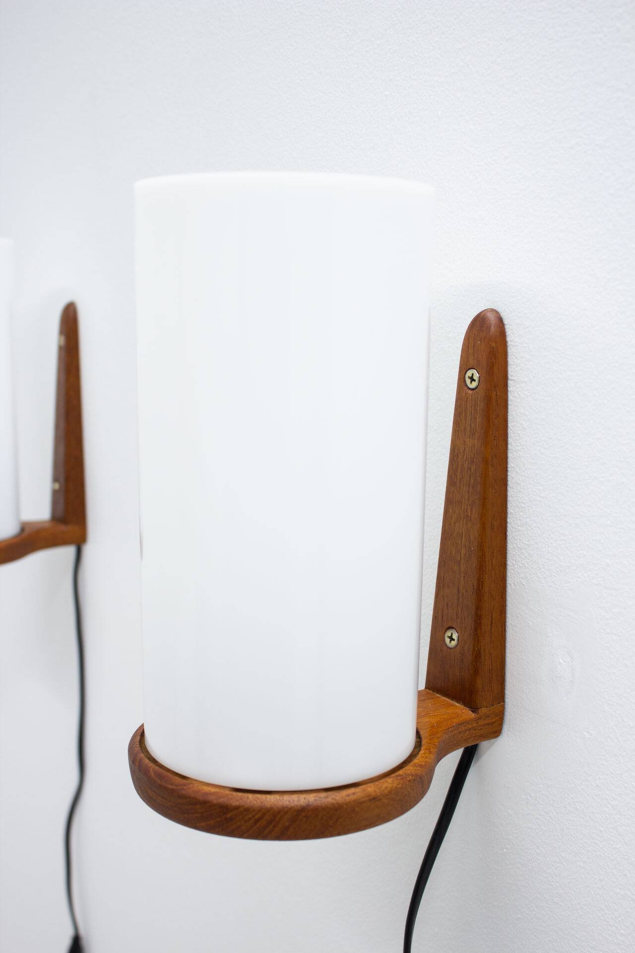 Pair of teak & acrylic sconces by Luxus, Sweden