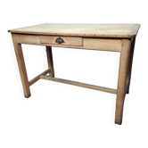 Antique farmhouse table in raw wood