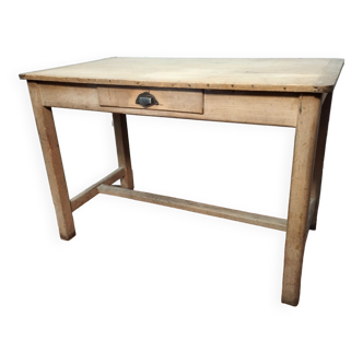 Antique farmhouse table in raw wood