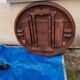 Round table in molded and carved oak with quill decoration, central shaft with 4 runners