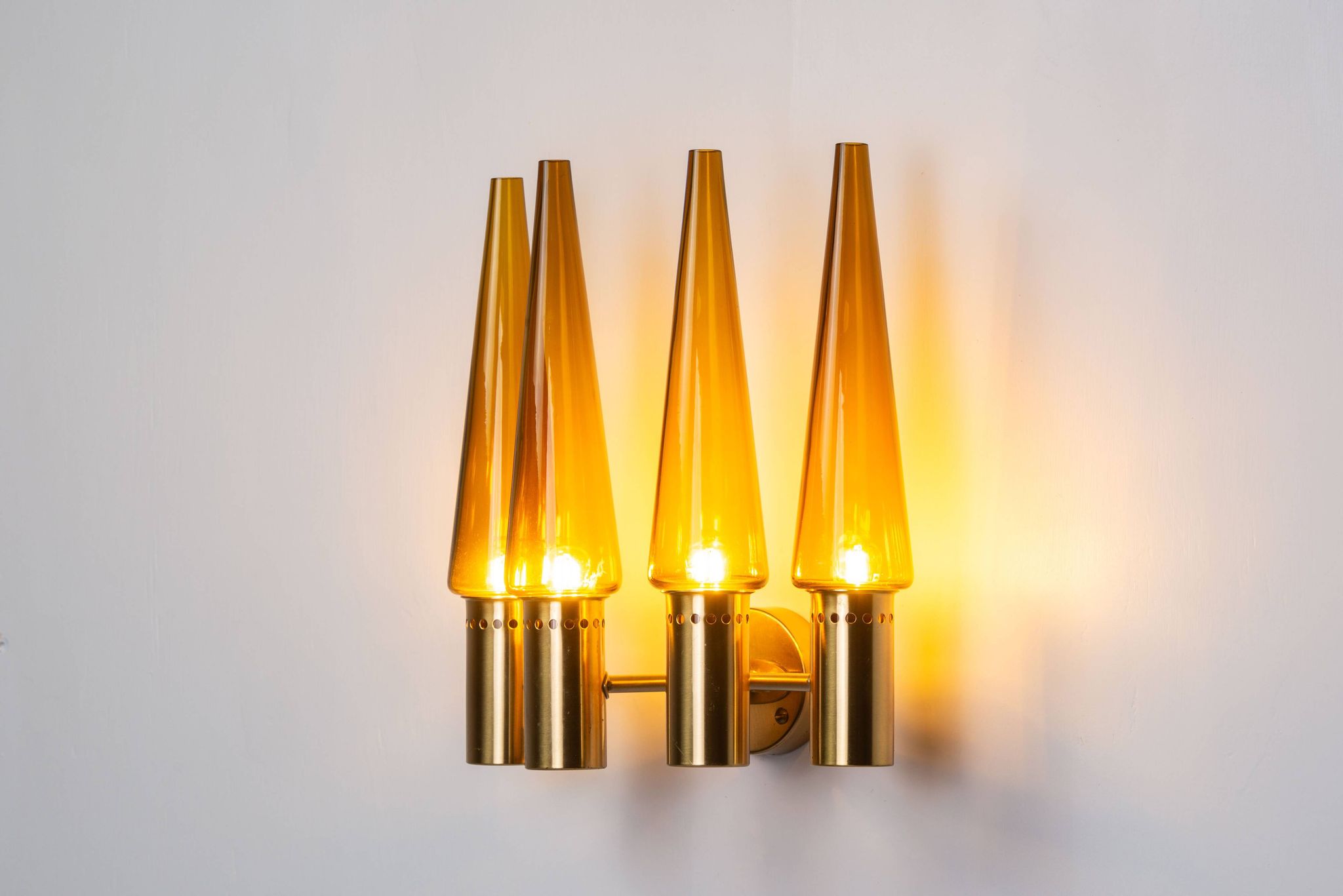 Hans Agne Jakobsson wall lamp made from brass with orange shades