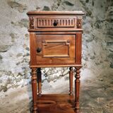 Antique French bedside table with a marble top.