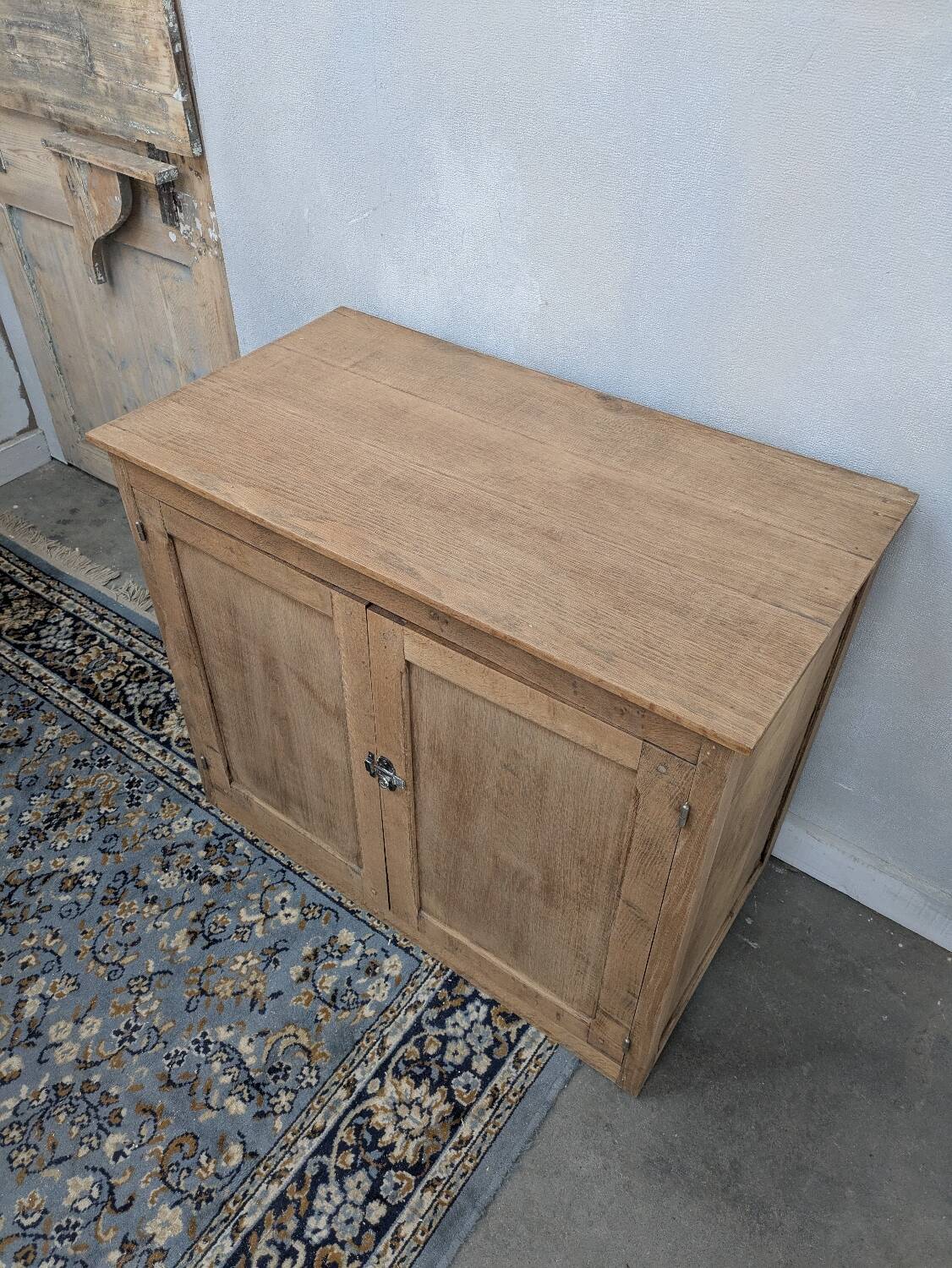 Small raw wood sideboard