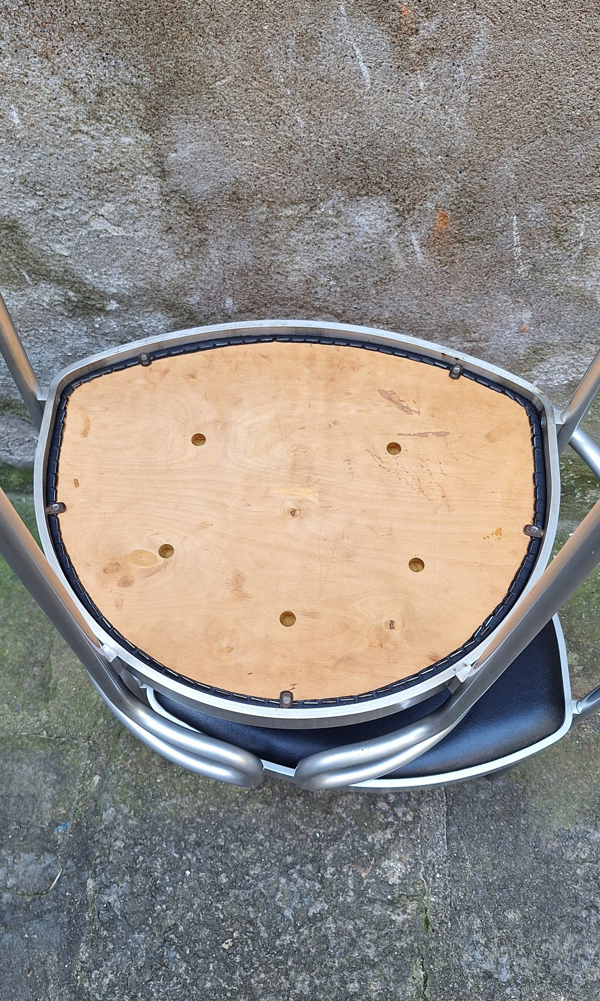 Pair of aluminum armchairs by Henning Larsen