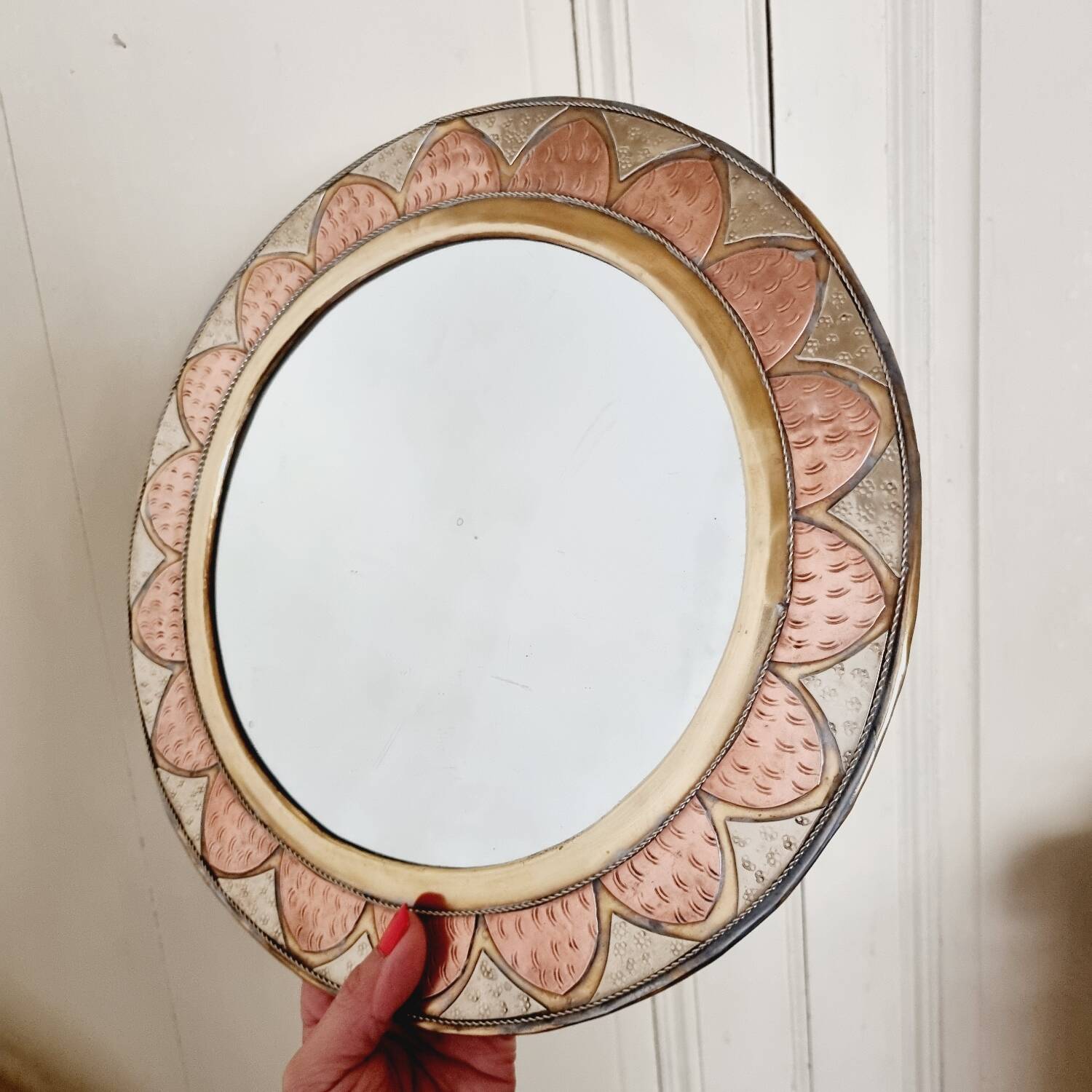 Round brass and copper mirror