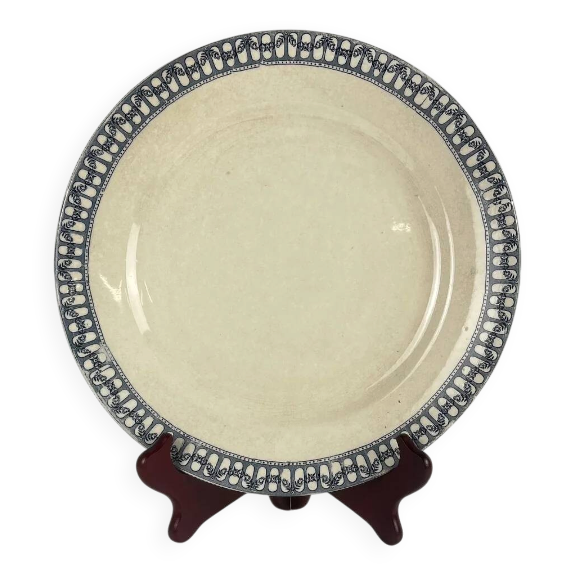 Round plate made of iron earth from Salins, late 19th century - early 20th century.