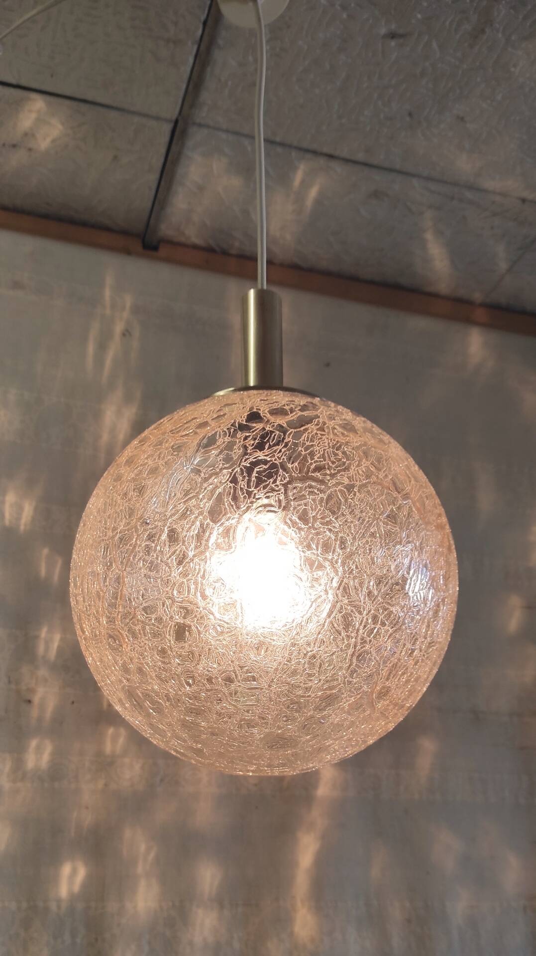 70's amber glass and brass suspension design