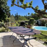 Artisanal wrought iron garden table