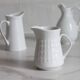 3 old French pitchers in white ceramic