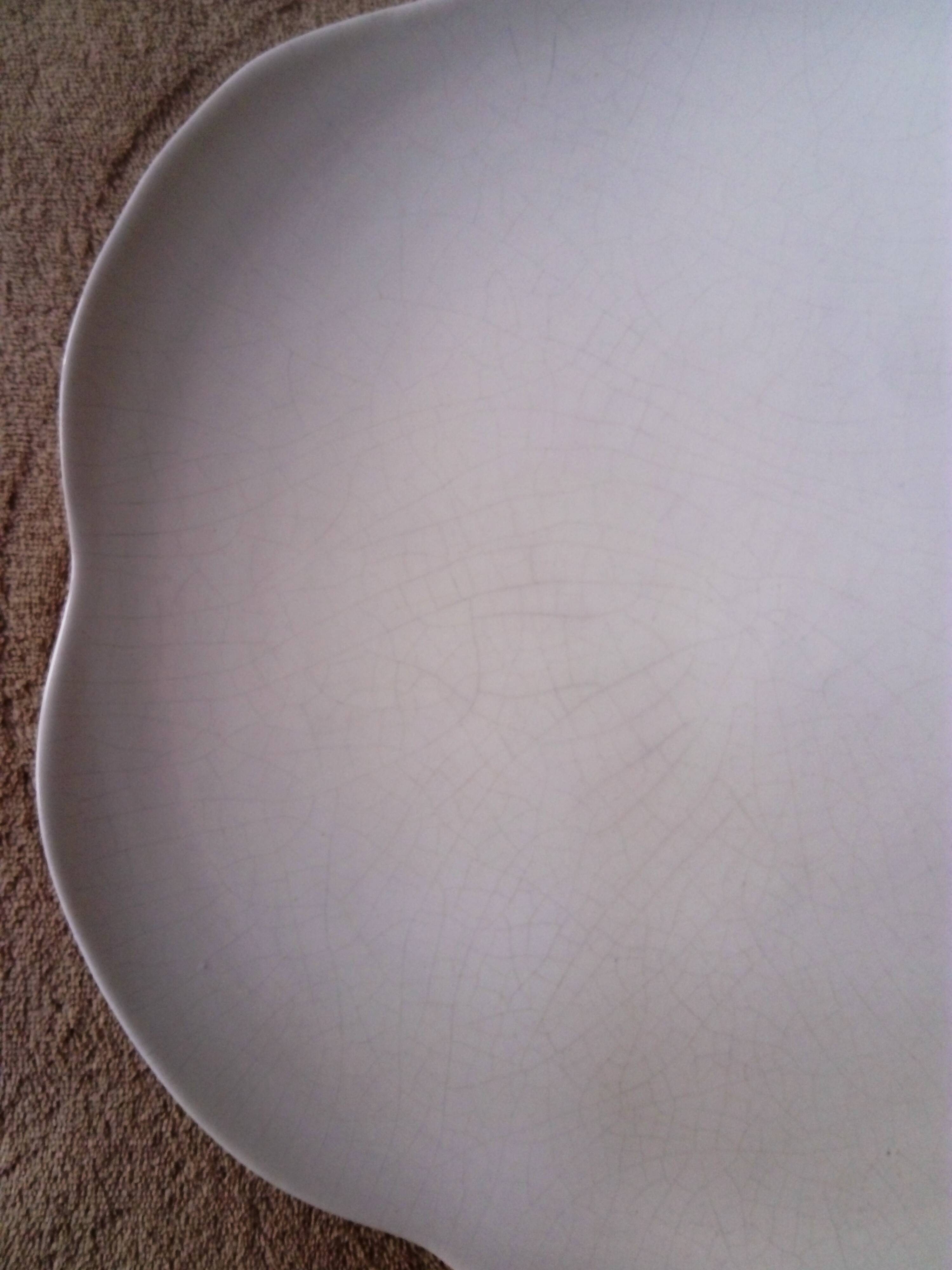 Large white multi-lobed pie or cake dish