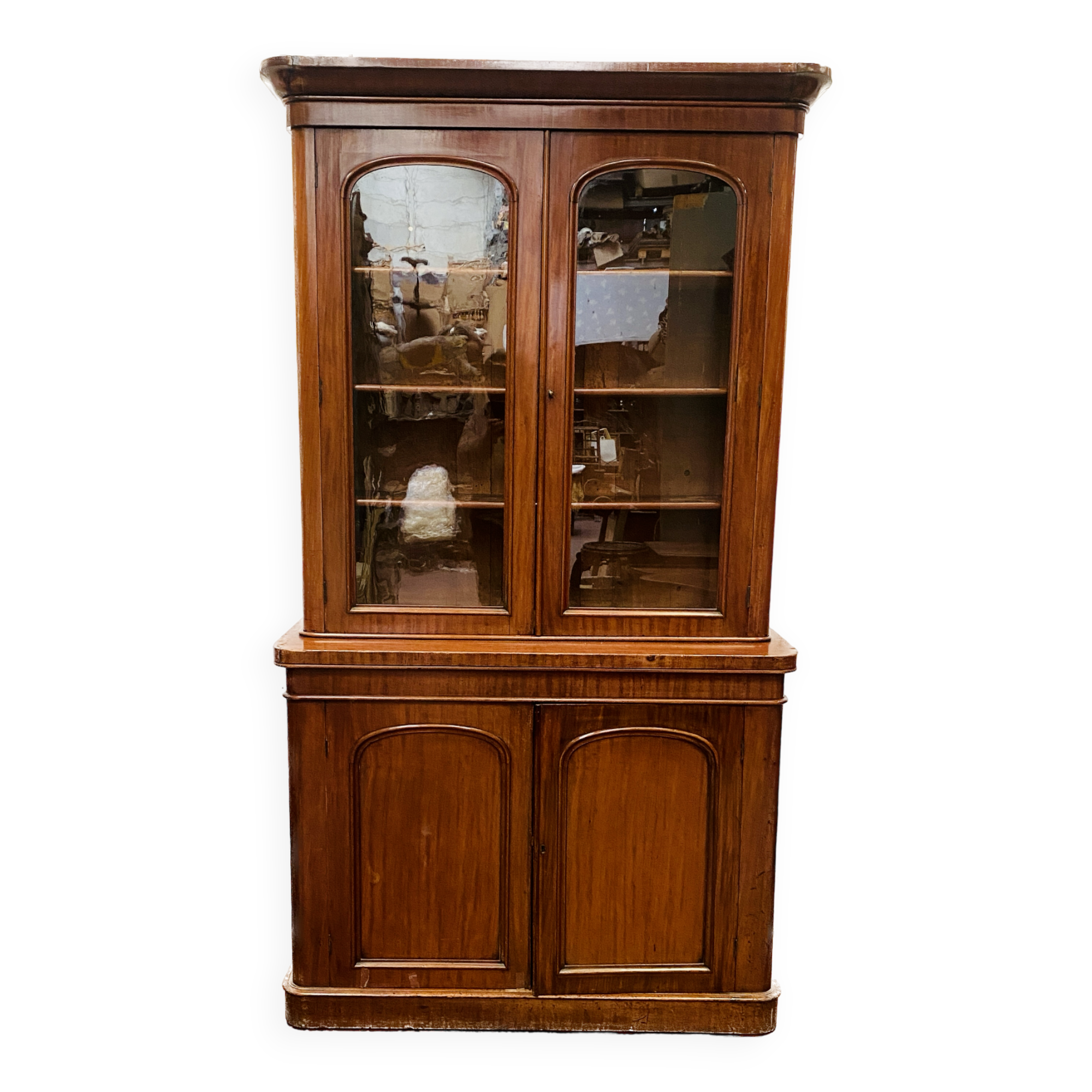 English showcase in two mahogany bodies and 19th century veneer