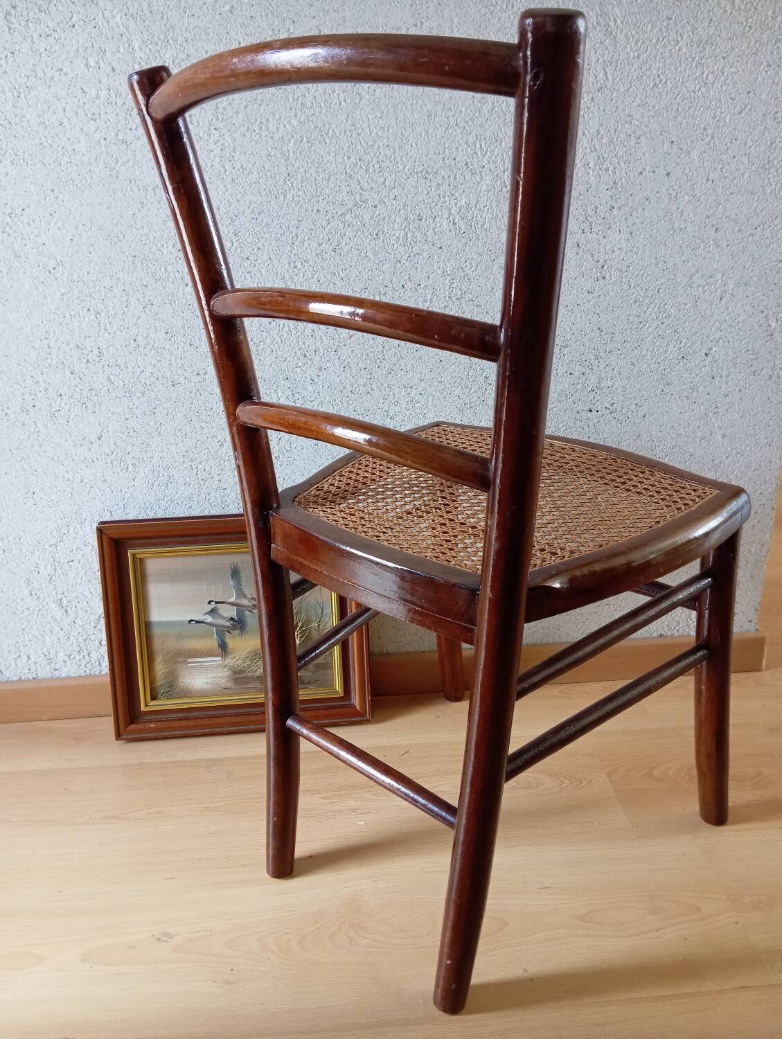 Wooden chair with cane seat, country style, around 1920