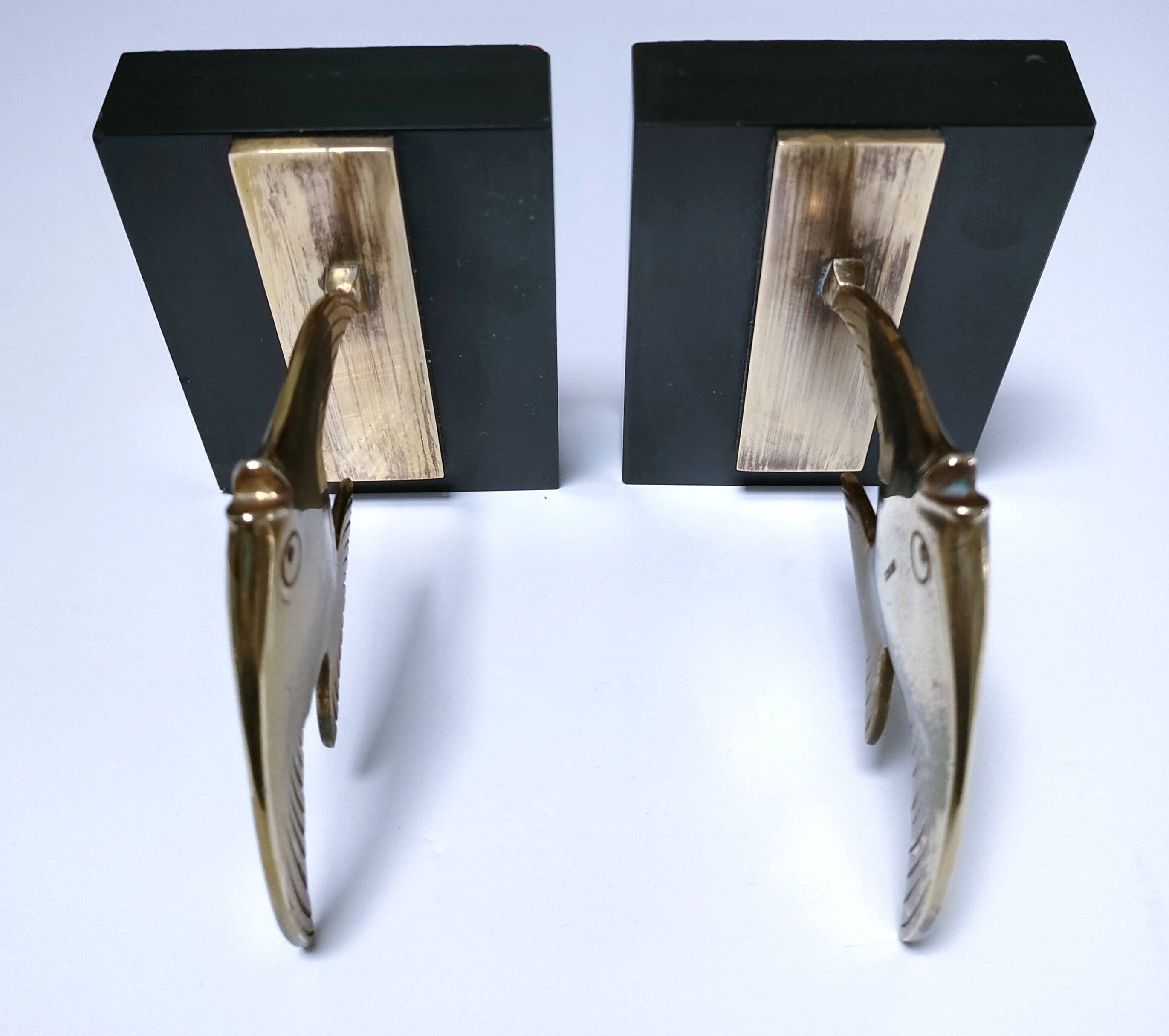 Pair of designer black marble bronze fish bookends
