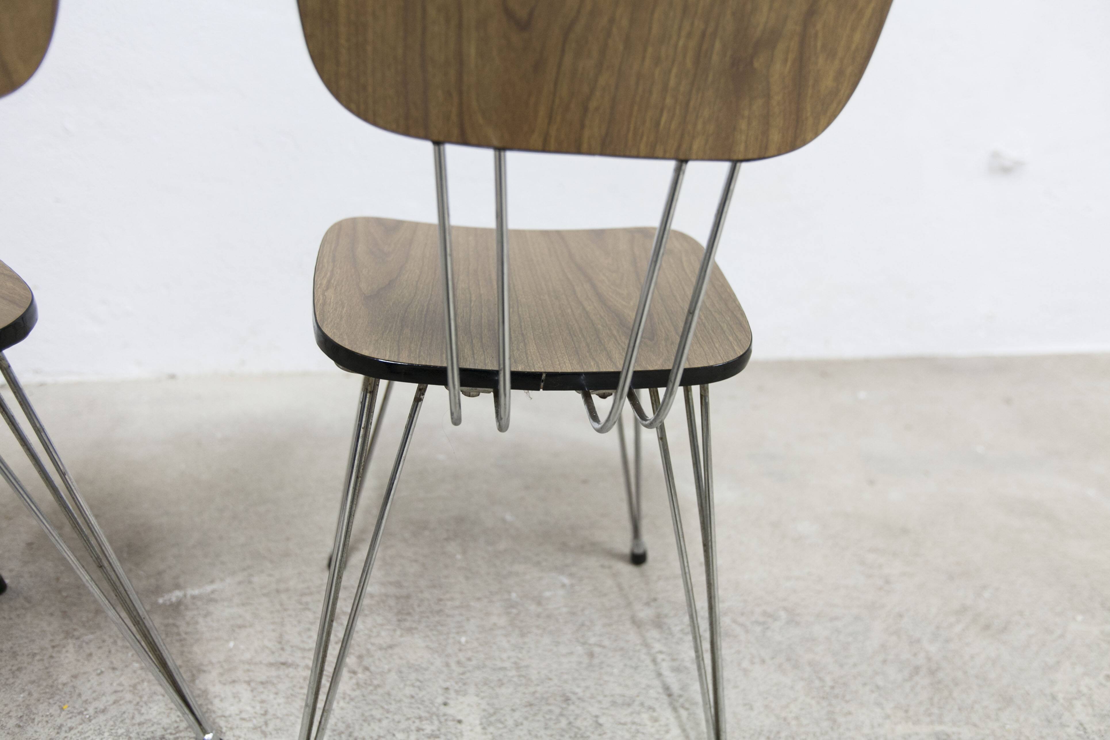 Pair of Formica 1970 brown Eiffel feet chairs