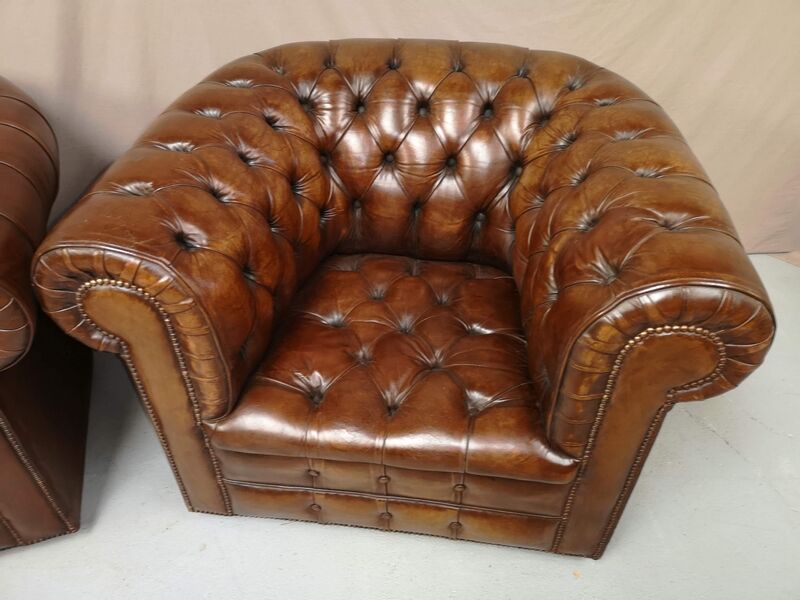 Pair of Chesterfield brown leather armchairs