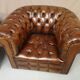 Pair of Chesterfield brown leather armchairs