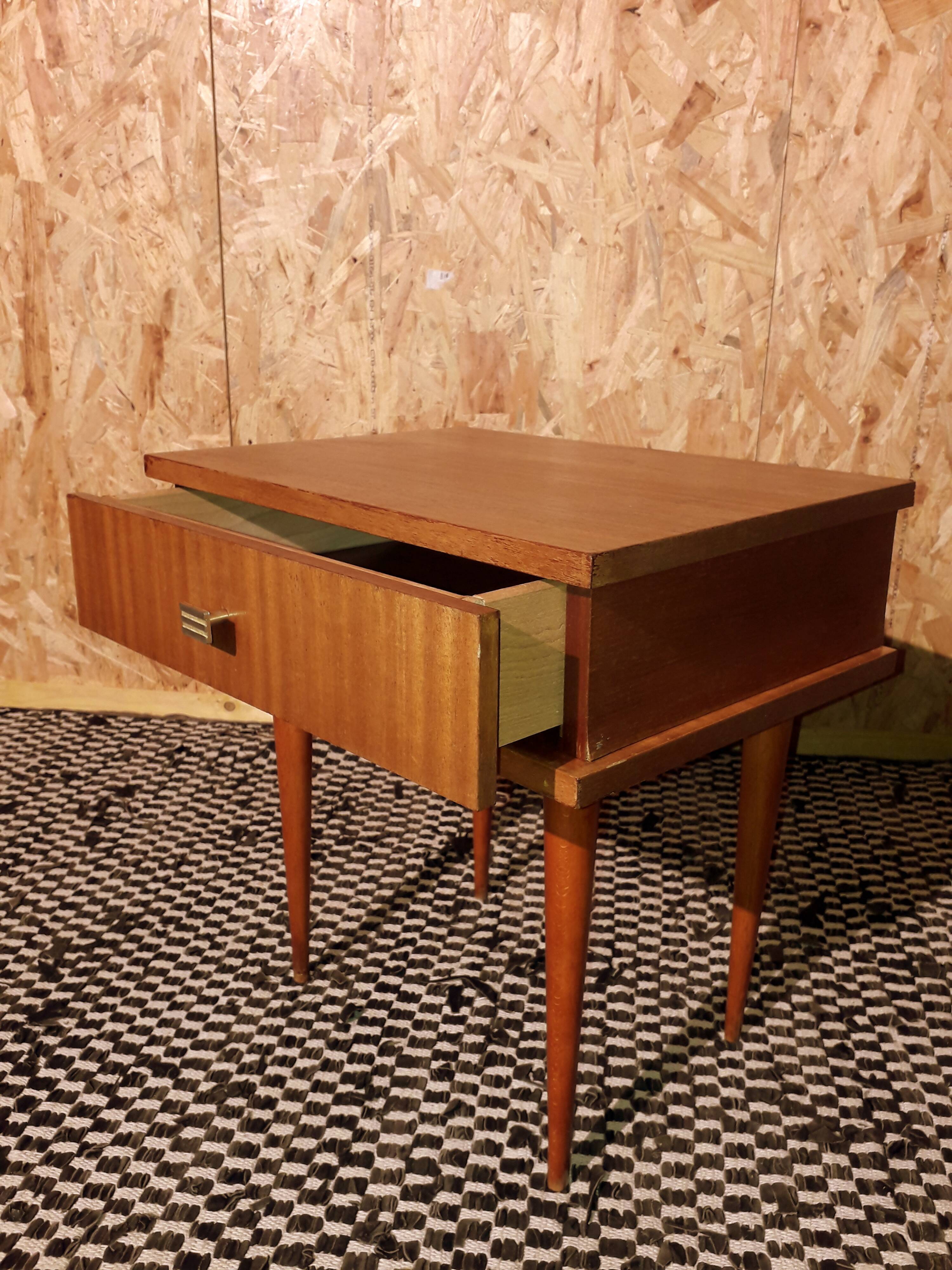 Bedside table with compass feet