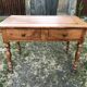 Louis Philippe style old cherry desk table with 2 drawers and 1 pull.