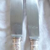 Set of 9 table knives in met. silver style louis XV "shell"