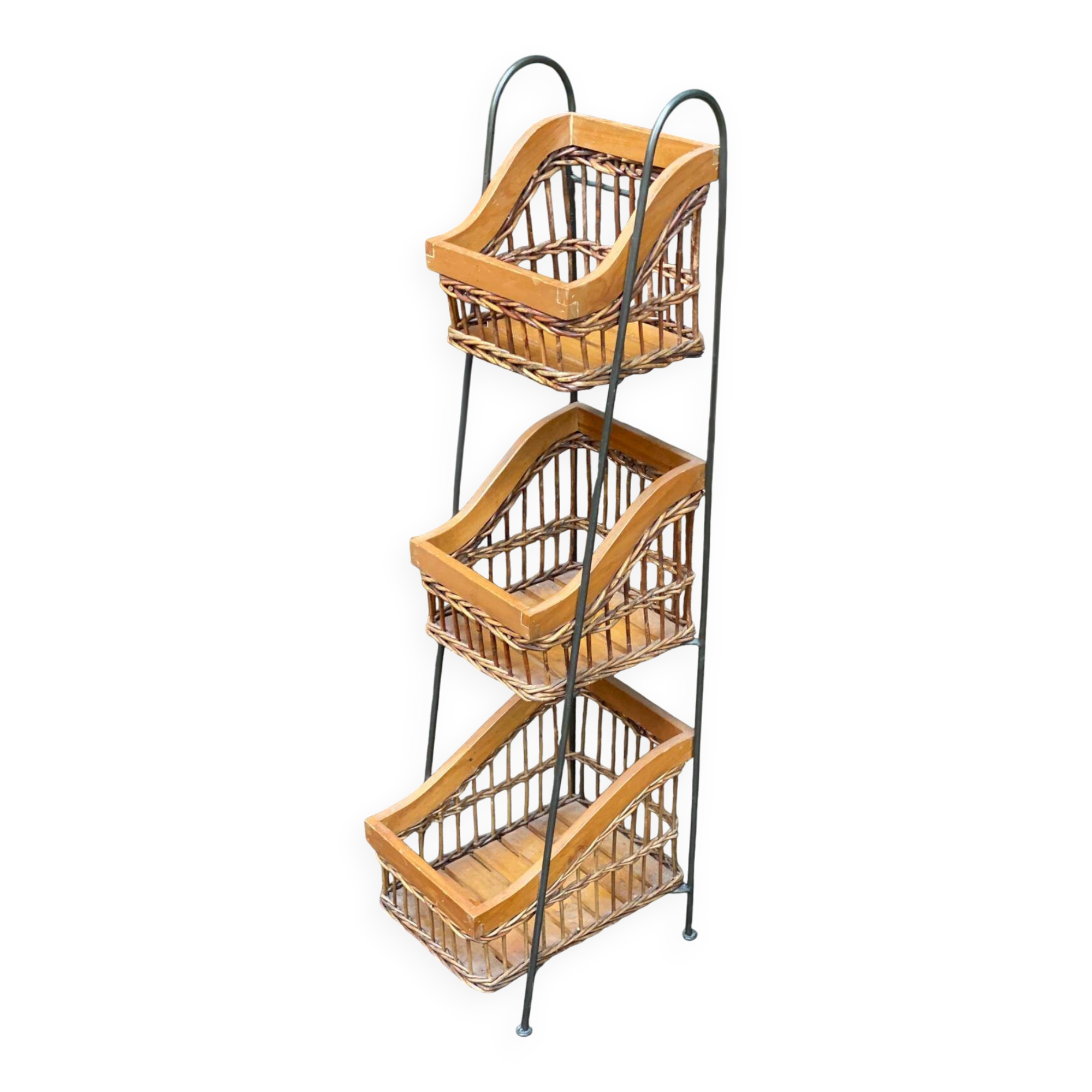 Woven rattan and steel display shelf in the shape of a staircase.
